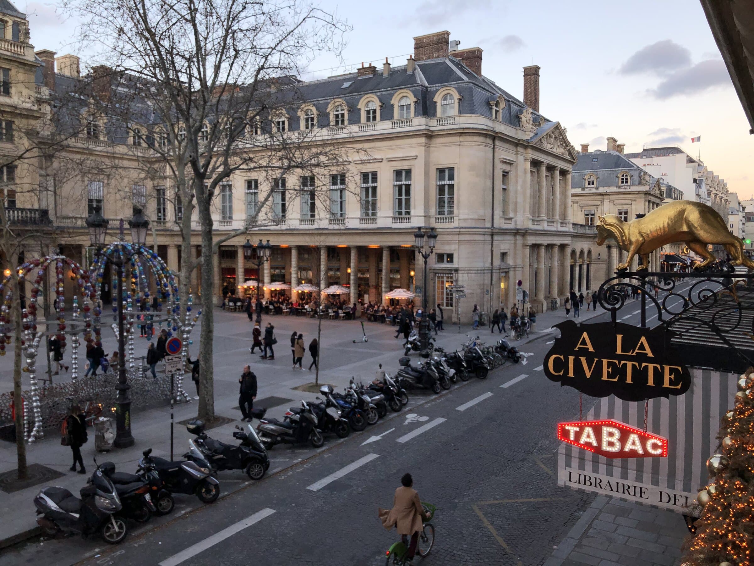 Paris café and street atmosphere during the evening.